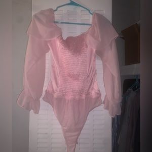 Pink ruffled blouse